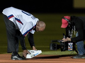 Former Montreal Expos Tim Raines is caught stealing 2nd base one more time prior to the start of the Pittsburgh Pirates - Toronto Blue Jays pre-season game at Olympic Stadium in Montreal, on Friday, March 31, 2017.