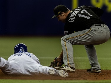The Pittsburgh Pirates Phil Gosselin tags Toronto Blue Jays Jake Elmore out at 2nd base to end the pre-season game tied 1-1 at Olympic Stadium in Montreal, on Friday, March 31, 2017.