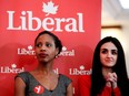 Yolande James, left, and Emmannuella Lambropoulos wait for the announcement during the Liberal party riding nomination meeting in Montreal on Wednesday March 8, 2017.  (Allen McInnis / MONTREAL GAZETTE)