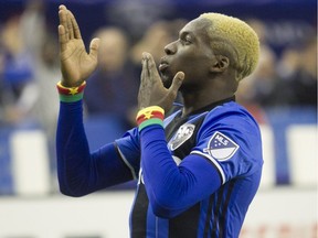 Montreal Impact's Ambroise Oyongo blows kisses to the crowd after scoring goal during second half action in game 1 of the MLS Eastern Conference final held at Olympic stadium in Montreal on Tuesday November 22, 2016 against Toronto FC.