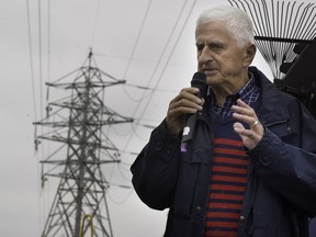 In October 2016, Dollard-des-Ormeaux  Mayor Ed Janiszewski  speaks to protesters who want Hydro-Quebec to bury new power lines that will be installed between Sources and St-Jean Bvds.