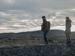 Noah (Natar Ungalaaq) befriends Carmen (Marie-Josée Croze), who is trying to find out what happened to her husband in Benoît Pilon's Iqaluit.