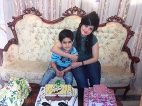Older sister Sepideh Bahrami, right, with her adoptive brother Payman Bahrami in Iran. Their parents are seeking a certificate from Quebec so the boy could join the rest of the family in Montreal. Photo courtesy of the family