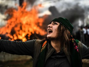 Photo of the day: A Kurdish woman dances in front of a fire as Turkish Kurds gather for Newroz celebrations for the new year in Diyarbakir, southeastern Turkey, March 21, 2017. Newroz (also known as Nawroz or Nowruz) is an ancient Persian festival marking the first day of spring.