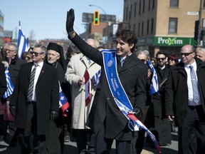 Canadian Prime Minister Justin Trudeau marches in the Greek Independence Day Parade in Montreal on Sunday, March 26, 2017.