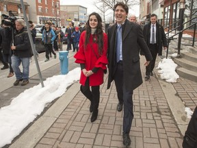 Prime Minister Justin Trudeau campaigns with Liberal candidate Emmanuella Lambropoulos for the byelection in the St-Laurent riding, Sunday, March 26, 2017 in Montreal.