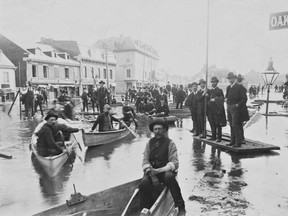 Flood in Chaboillez Square (where the Montreal Planetarium now stands, near the corner of Peel St. and St. Jacques St.), Montreal, about 1886.