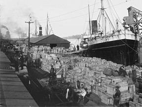 Longshoremen unload cargo from the steamship S.S Durham City in the port of Montreal in 1896.