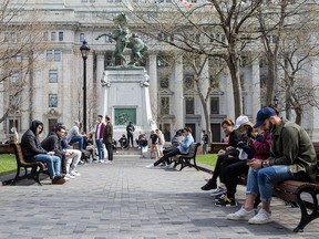 Sneaker fans wait for their chance to buy Yeezy sneakers in Dorchester Square in downtown Montreal on Saturday, April 29, 2017.