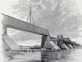 Wood engraving of framed deck placed over Victoria Bridge piers, 1860.