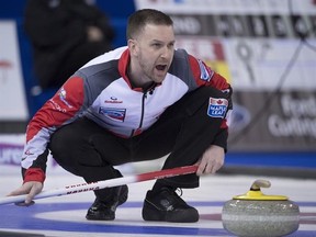 Canada skip Brad Gushue calls a shot during the 8th draw against the United States at the Men&#039;s World Curling Championships in Edmonton, Monday, April 3, 2017. THE CANADIAN PRESS/Jonathan Hayward