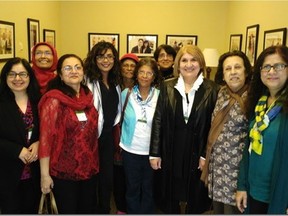 Amira Elias, pictured in black leather coat, and other members of the Montreal chapter of the Canadian Council of Muslim Women, visited MP Iqra Khalid, fourth from left, in Ottawa, April 3, 2017.