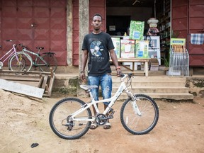 Bike recipient Mohamed, 27, in Ghaha. This photo will be part of the Cyclo Nord Sud Montreal exhibit at Photo Café, until May 18, 2017.