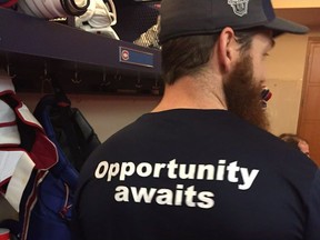 Canadiens players, including defenceman Jordie Benn, found new T-shirts in their locker stalls before the morning skate in Brossard before Game 1 of their playoff series against the New York Rangers at the Bell Centre on April 12, 2017. On the front is written "ALL IN" and on the back is "Opportunity awaits" written in the native language of each player.