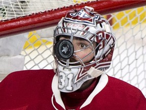 Canadiens goaltender Carey Price keeps a close eye on the puck during third period of Game 5 NHL Stanley Cup first round playoff hockey action against the New York Rangers in Montreal on Thursday, April 20, 2017.