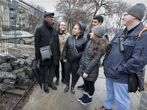 David Clarke, left, with Alexandre Mills, Summit Ollivierre, Teejay Bhalla, Audrey Medaino-Tardif and Steven High in Little Burgundy. "Seeing this empty lot now, it's hard to imagine how vital the NCC was during its Golden Age," High says.