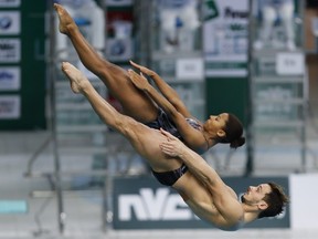 François Imbeau-Dulac and Jennifer Abel of Canada compete in the Mixed 3m Synchro Springboard final on day two of the FINA/NVC Diving World Series 2017 Beijing Station at the National aquatics center-Water Cube on March 4, 2017 in Beijing, China.