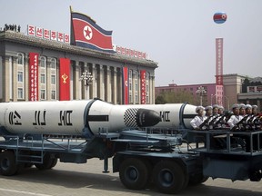 In this Saturday, April 15, 2017, file photo, a submarine missile is paraded across Kim Il Sung Square during a military parade in Pyongyang, North Korea to celebrate the 105th birth anniversary of Kim Il Sung, the country's late founder and grandfather of current ruler Kim Jong Un. North Korea's big day, the anniversary of the birth of its founding leader, Kim Il Sung, came and went with no underground nuclear test by the North, and no pre-emptive strikes off the deck of the USS Carl Vinson aircraft carrier sent to waters off the Korean Peninsula by President Donald Trump. Just hours before Vice President Mike Pence began his visit to Seoul on Sunday, Pyongyang fired off a ballistic missile -- but it appears to have exploded seconds after it got off the ground.