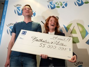 Nathalie Langlais and Gilles Rosnen, seen here at Loto-Quebec headquarters on Monday, say they hid the winning ticket in their daughter's toy box during the weekend.