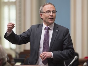 Quebec Public Security Minister and Municipal Affairs Minister Martin Coiteux responds to the Opposition during question period Tuesday, April 25, 2017 at the legislature in Quebec City.