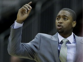 In this Nov. 21, 2016 file photo, George Washington head coach Maurice Joseph talks to his players during the first half of an NCAA college basketball game in Kansas City, Mo.