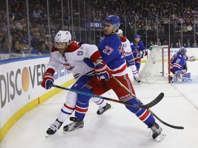 Rangers' Ryan McDonagh pushes Canadiens captain Max Pacioretty during first period in Game 4 of the Eastern Conference playoffs at Madison Square Garden on April 18, 2017 in New York City.