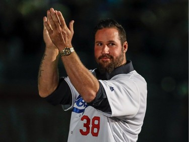 Quebec-born MLB players including former L.A. Dodger pitcher Eric Gagné applauded the crowd during a pregame ceremony prior to the Pittsburgh Pirates - Toronto Blue Jays preseason game at Olympic Stadium in Montreal, on Saturday, April 1, 2017.