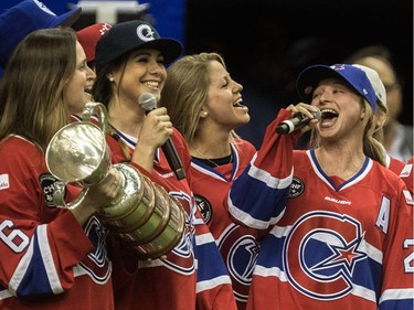 The Montreal Canadiennes, winners of the Clarkson Cup, sang Take Me Out to the Ball Game during the 7th inning stretch during the Pittsburgh Pirates - Toronto Blue Jays preseason game at Olympic Stadium in Montreal, on Saturday, April 1, 2017. Left to right: Carly Hill, Jordanna Peroff, Sophie Brault, Ann-Sophie Bettez.