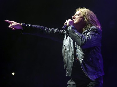 Def Leppard singer Joe Elliott performs with his bandmates during concert in Montreal Monday April 10, 2017.