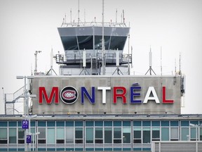 The sign on Pierre Elliot Trudeau Airport has been given Montreal Canadiens colours in Montreal on April 11, 2017.