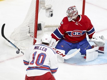 Montreal Canadiens Carey Price makes a save on a shot by New York Rangers J.T. Miller  during 2nd period of game 1 of the first round of the NHL playoffs in Montreal Wednesday April 12, 2017.