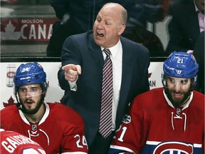 Montreal Canadiens coach Claude Julien argues with a referee during the last minute of game 1 of the first round of the NHL playoff game against the New York Rangers in Montreal Wednesday April 12, 2017.