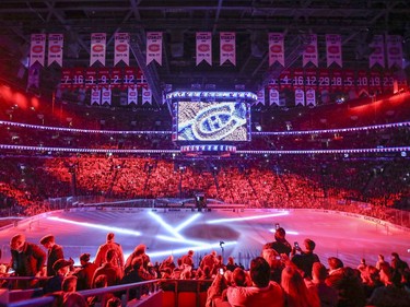 Montreal Canadiens fans take in light show prior to game 1 of the first round of the NHL playoff game against the New York Rangers in Montreal Wednesday April 12, 2017.