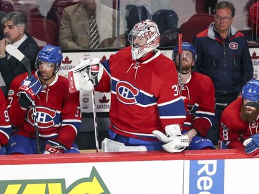 Montreal Canadiens goalie Carey Price watches the last minute of play from the bench during 3rd period of game 1 of the first round of the NHL playoffs against the New York Rangers in Montreal Wednesday April 12, 2017.