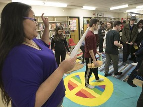 Nina Segalowitz (left) introduces students to the blanket exercise as part of Aboriginal Day at Lindsay Place High School in Pointe-Claire on on April 12.