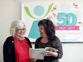 Lynda Barrett (right), executive director of Volunteer West Island, with Fran Thomson, a long-time volunteer at the group's offices in Ste-Anne-de-Bellevue, last Thursday.