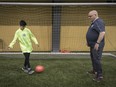 James Maurais, seen here with his daughter, Presley, is organizing a new soccer program for children with special needs in St-Lazare.