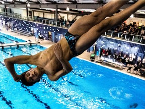 A competitor in action at the 7th annual Junior and Senior Dragon Provincial Diving Championships at the Pointe-Claire aquatic centre on Sunday.