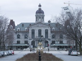 Marché Maisonneuve and the Olympic Tower, seen from Morgan Ave. in Mercier-Hochelaga-Maisonneuve on Thursday April 20, 2017. (Pierre Obendrauf / MONTREAL GAZETTE)