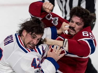 Montreal Canadiens centre Andrew Shaw (65) and New York Rangers defenceman Brendan Smith (42) duke it out during 1st period action of game 5 of the playoffs at the Bell Centre in Montreal, on Thursday, April 20, 2017.