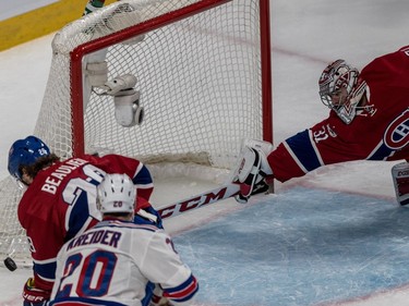 Montreal Canadiens goalie Carey Price (31) dives for the puck against the New York Rangers during 2nd period action of game 5 of the playoffs at the Bell Centre in Montreal, on Thursday, April 20, 2017.