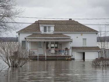 MONTREAL, QUE.: APRIL 22, 2017 --  A home in Hudson Quebec, west of Montreal flooded by the overflowing Ottawa river on Saturday, April 22, 2017. (Peter McCabe / MONTREAL GAZETTE) ORG XMIT: 58488