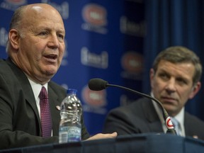 Montreal Canadiens head coach Claude Julien left,  speaks with reporters as general manager, Marc Bergevin right, looks on at the Bell Sports Complex in Brossard on Monday, April 24, 2017.