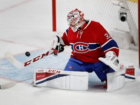 MONTREAL, QUE.: APRIL 7, 2017-- Montreal Canadiens goalie Carey Price knocks the puck to the ice as he makes a save against the Tampa Bay Lightning during NHL action at the Bell Centre in Montreal on Friday April 7, 2017. (Allen McInnis / MONTREAL GAZETTE) ORG XMIT: 58390