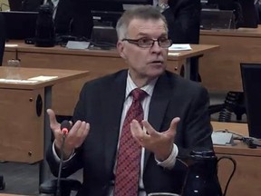 Normand Bédard, the former president of the construction firm Sintra, pictured testifying at the Charbonneau Commission in 2014. The Quebec Order of Engineers' disciplinary council announced Monday that Bédard will be fined $10,000 for breaching the province's code of ethics for engineers.