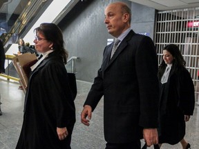 Defence lawyer Isabel Schurman and client Frank Zampino leave the courtroom at the Palais de Justice in Montreal, on Friday, Feb. 3, 2017.