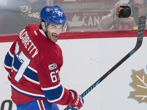 Montreal Canadiens left-wing Max Pacioretty smiles after scoring his third goal against the Buffalo Sabres during the third period of their NHL hockey match in Montreal on Tuesday, January 31, 2017.