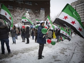 Syrian Montrealers at Norman Bethune Square in Montreal in March 2015 to mark the fourth anniversary of Syrian uprising.