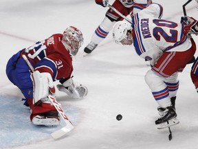 Goalie Carey Price of the Montreal Canadiens keeps a close watch on Chris Kreider of the New York Rangers in the second period at the Bell Centre Thursday, October 15, 2015 in Montreal.