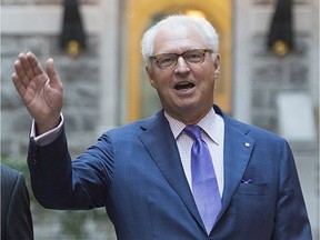 Power Corporation Deputy Chairman, President and Co-CEO André Desmarais arrives for the company's annual general meeting in Montreal, Friday, May 13, 2016.
